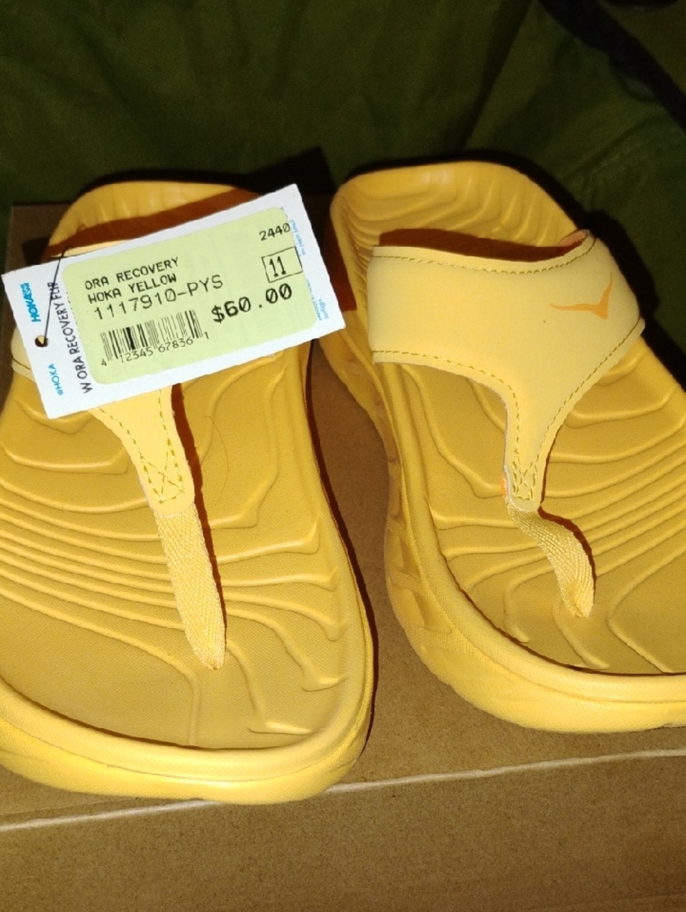 Hoka Women's Yellow Foam Recovery Sandals Never worn .